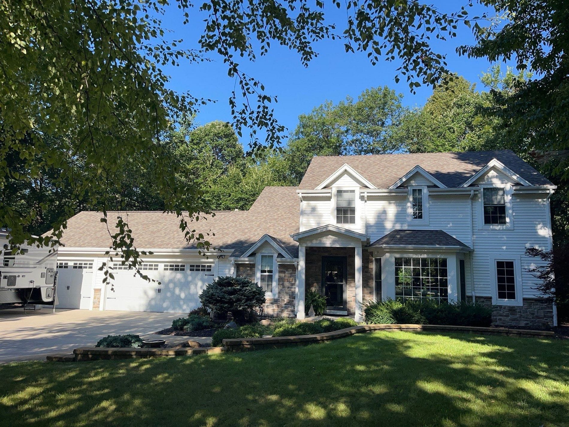 Cavitt Before Wind Lake home before siding & roofing upgrade